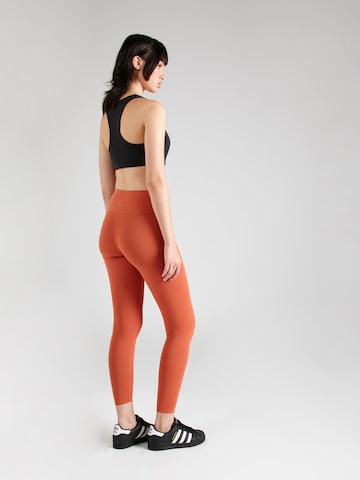 Yvette Sports Skinny Workout Pants 'Merle' in Orange