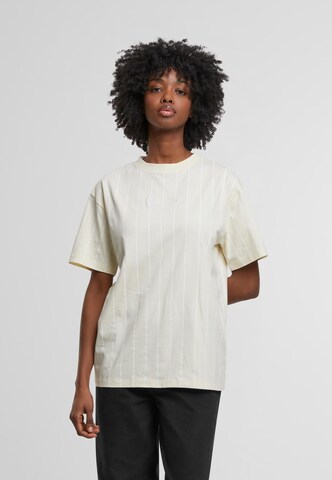 T-shirt Karl Kani en beige : devant