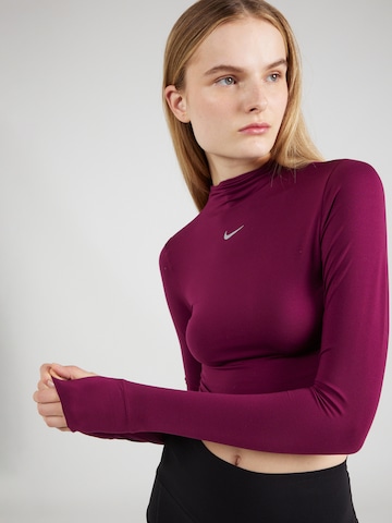 NIKE Performance shirt 'One Luxe Ess' in Red
