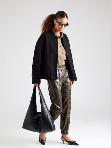 Tapered Pantaloni di Marc Cain in verde