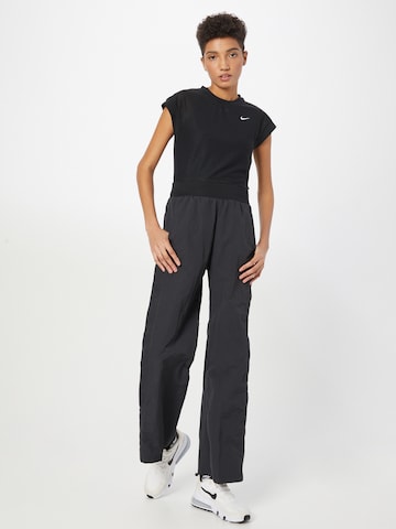 Nike Sportswear Zvonové kalhoty Kalhoty – černá