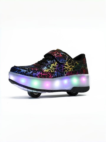 HUSKSWARE Inline and Roller Skates in Black: front