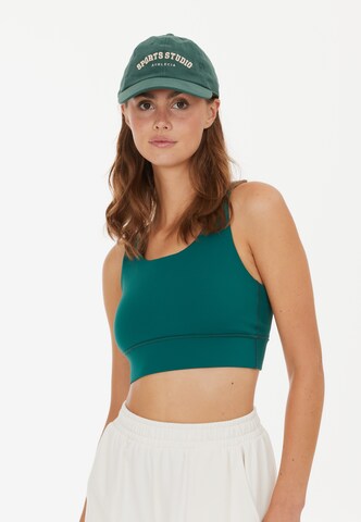 Athlecia Medium Support Sports Bra 'Gaby' in Green: front