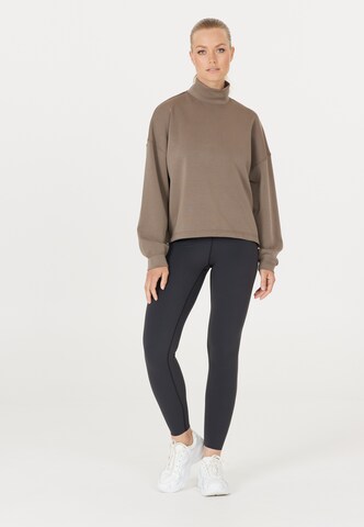 Athlecia Skinny Tights 'Stay' in Schwarz