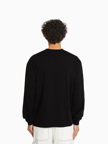 Sweat-shirt Bershka en noir