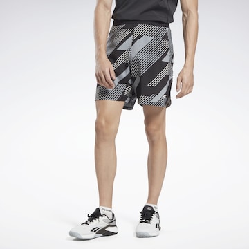 Reebok Regular Workout Pants in Black: front