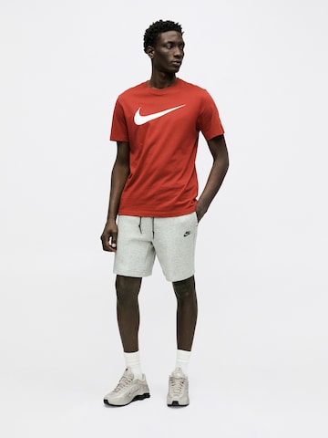 Loosefit Pantaloni 'TECH FLC' di Nike Sportswear in grigio