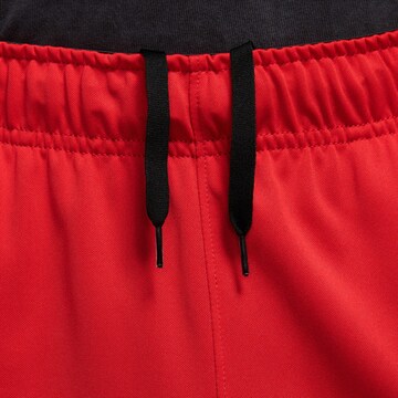 NIKE Regular Workout Pants 'Totality' in Red