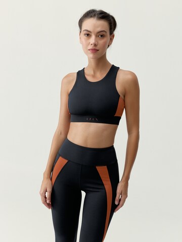 Born Sporttop ' Tao ' in Zwart: voorkant