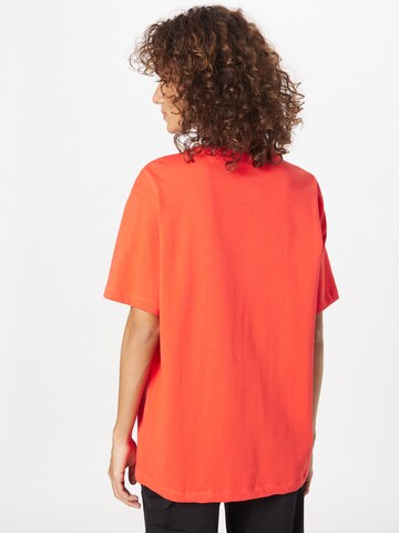 NIKE Funkčné tričko 'Air' - oranžová