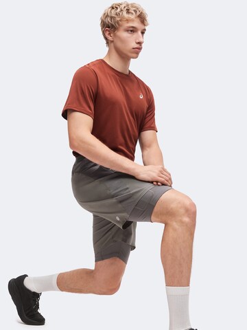 ASICS Normalny krój Spodnie sportowe 'ROAD' w kolorze szary