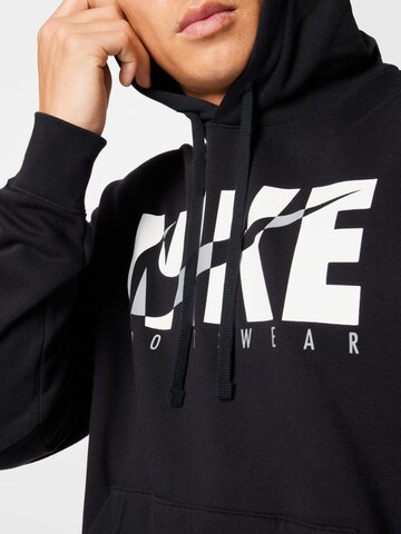 Nike Sportswear Trainingspak in Zwart
