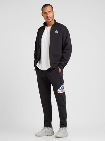 ADIDAS SPORTSWEAR Tapered Sports trousers in Black