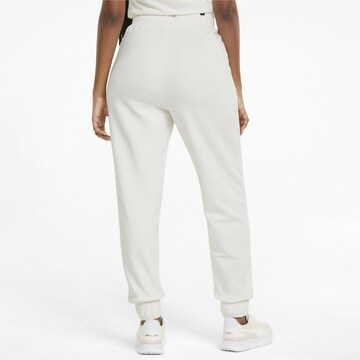 Effilé Pantalon de sport PUMA en blanc