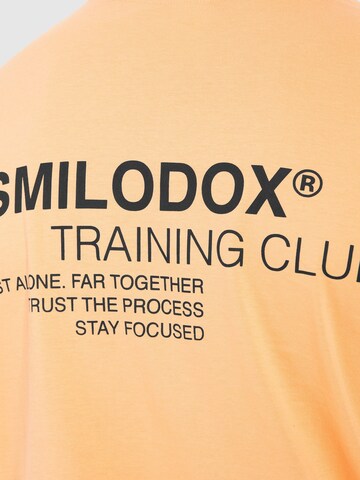 T-Shirt ' Cyris ' Smilodox en orange
