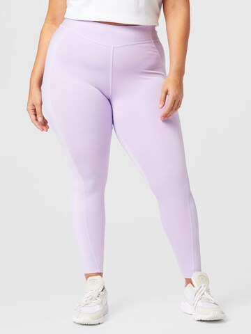 Skinny Pantalon de sport Reebok en violet : devant