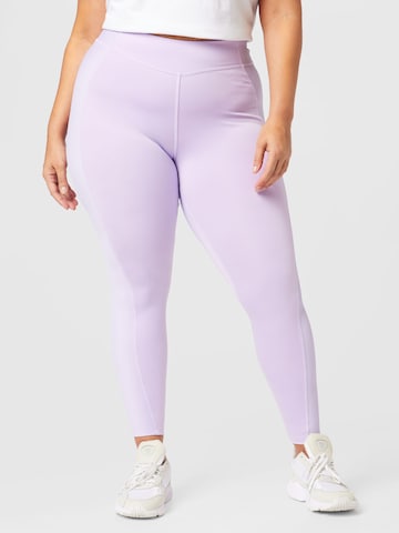 Reebok - Skinny Calças de desporto em roxo: frente