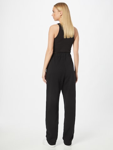 ABOUT YOU Limited Loose fit Pants 'Rico' in Black