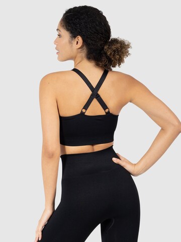 Smilodox Bralette Sports bra 'Amber' in Black