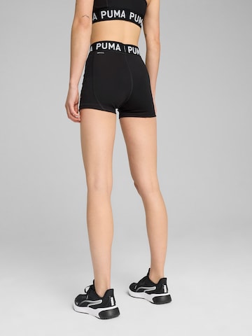 Skinny Pantaloni sportivi 'Strong 3' di PUMA in nero