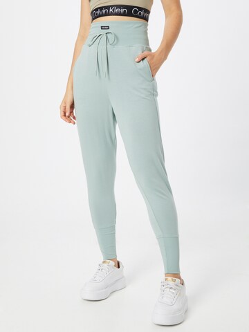 Tapered Pantaloni de la Calvin Klein Sport pe verde: față