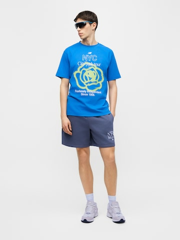 new balance T-shirt 'MT61018I' i blå