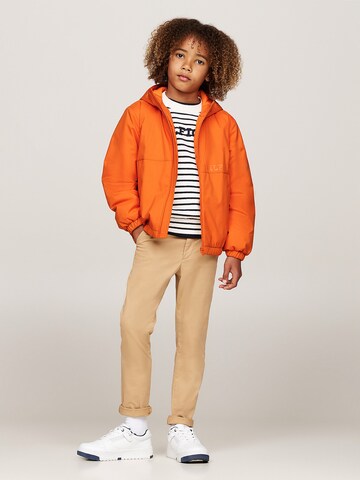 TOMMY HILFIGER Übergangsjacke in Orange