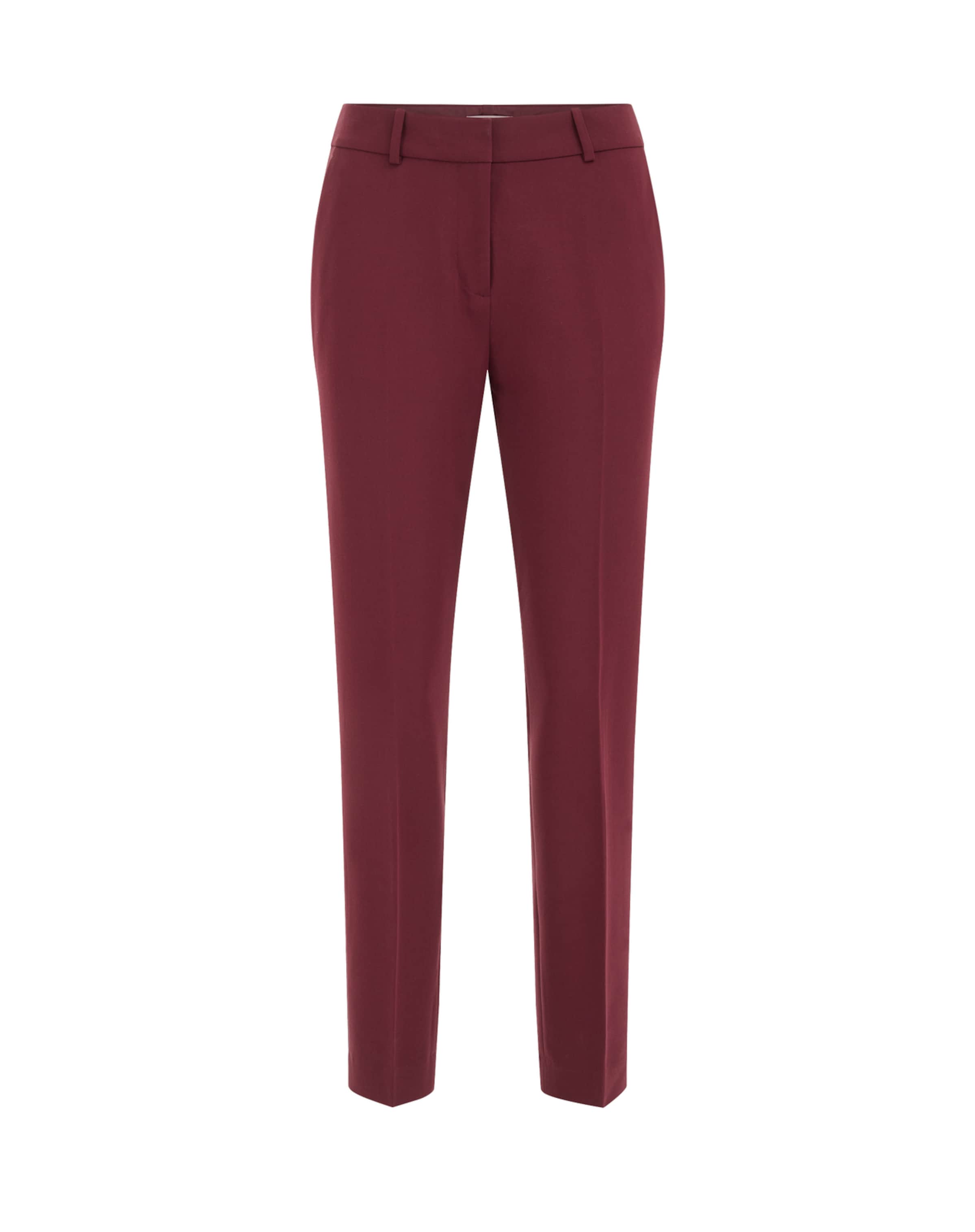 Slimfit Pantaloni con piega frontale di WE Fashion in rosso: frontale