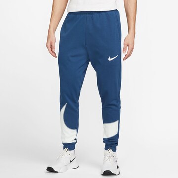 NIKE Tapered Athletic Pants in Blue: front