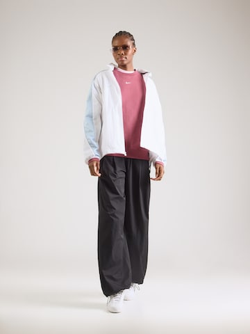 Nike Sportswear - Sudadera 'Studio' en rosa