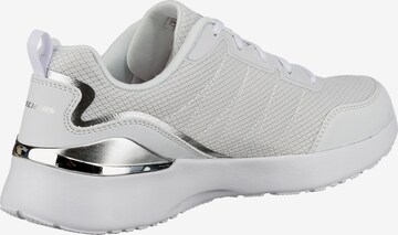 Baskets basses SKECHERS en blanc