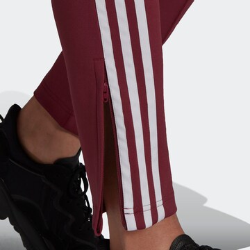 Coupe slim Pantalon 'Primeblue Sst' ADIDAS ORIGINALS en rouge