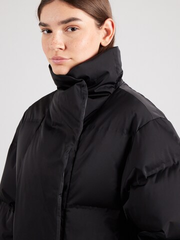 Cappotto di mezza stagione di & Other Stories in nero