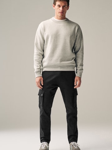 Next - Tapered Pantalón cargo en negro