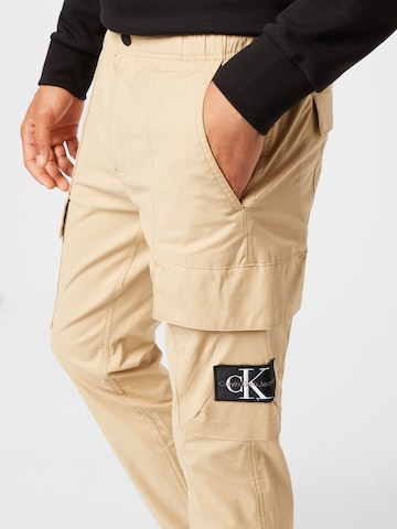 Calvin Klein Jeans Tapered Cargo trousers in Beige