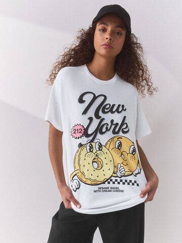 Next Μπλουζάκι 'New York Bagel' σε λευκό: μπροστά