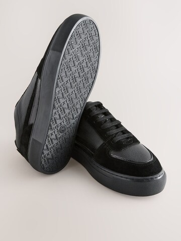 Baskets basses Next en noir