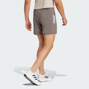 ADIDAS PERFORMANCE Regular Sporthose 'Own The Run' in Braun