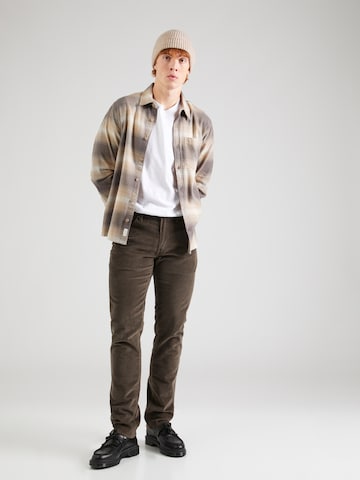 LEVI'S ® Slimfit Jeans '511 Slim' in Bruin