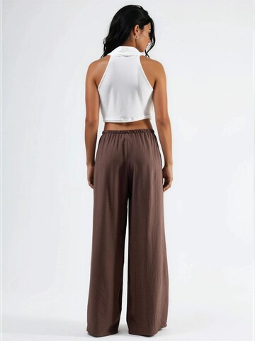 Busem - Perna larga Calças em castanho