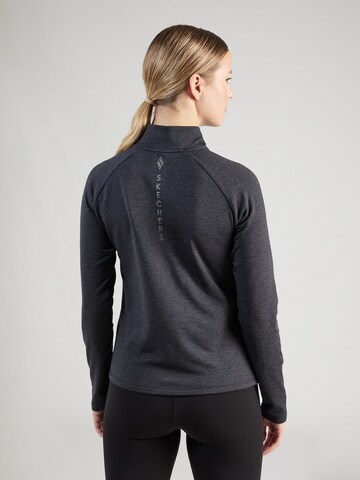 SKECHERS Sportsweatshirt 'ULTRA GO' i svart