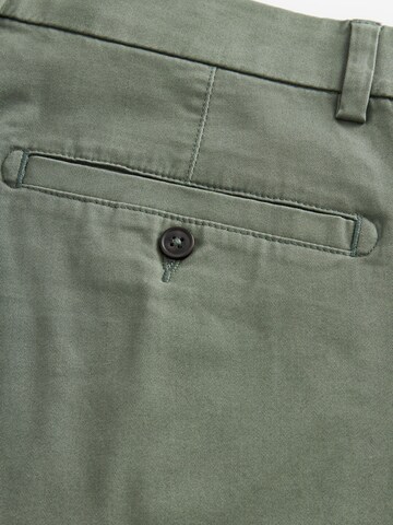 Slimfit Pantaloni chino di Next in verde