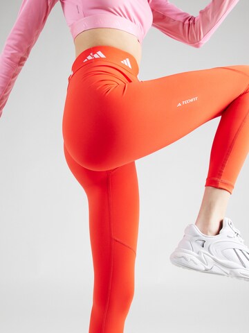 ADIDAS PERFORMANCE Skinny Urheiluhousut 'Techfit' värissä punainen