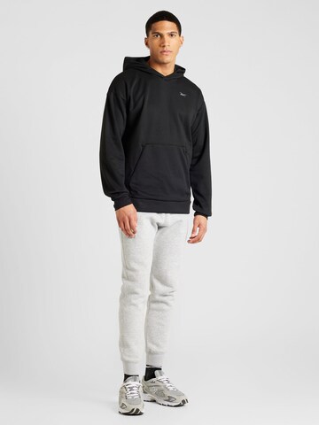 ReebokSportska sweater majica - crna boja