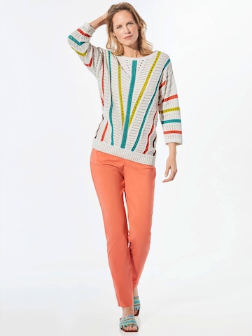 Goldner Pullover in Weiß