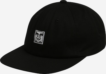 Obey Caps i svart: forside