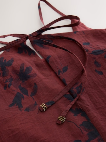 Next Zomerjurk in Bruin