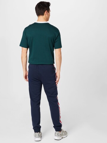 Champion Authentic Athletic Apparel - Tapered Calças em azul