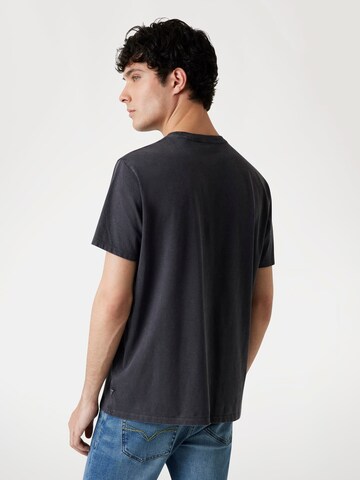 GUESS T-Shirt in Schwarz