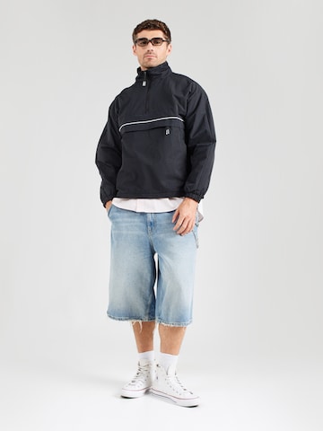 ELLESSE Преходно яке в черно